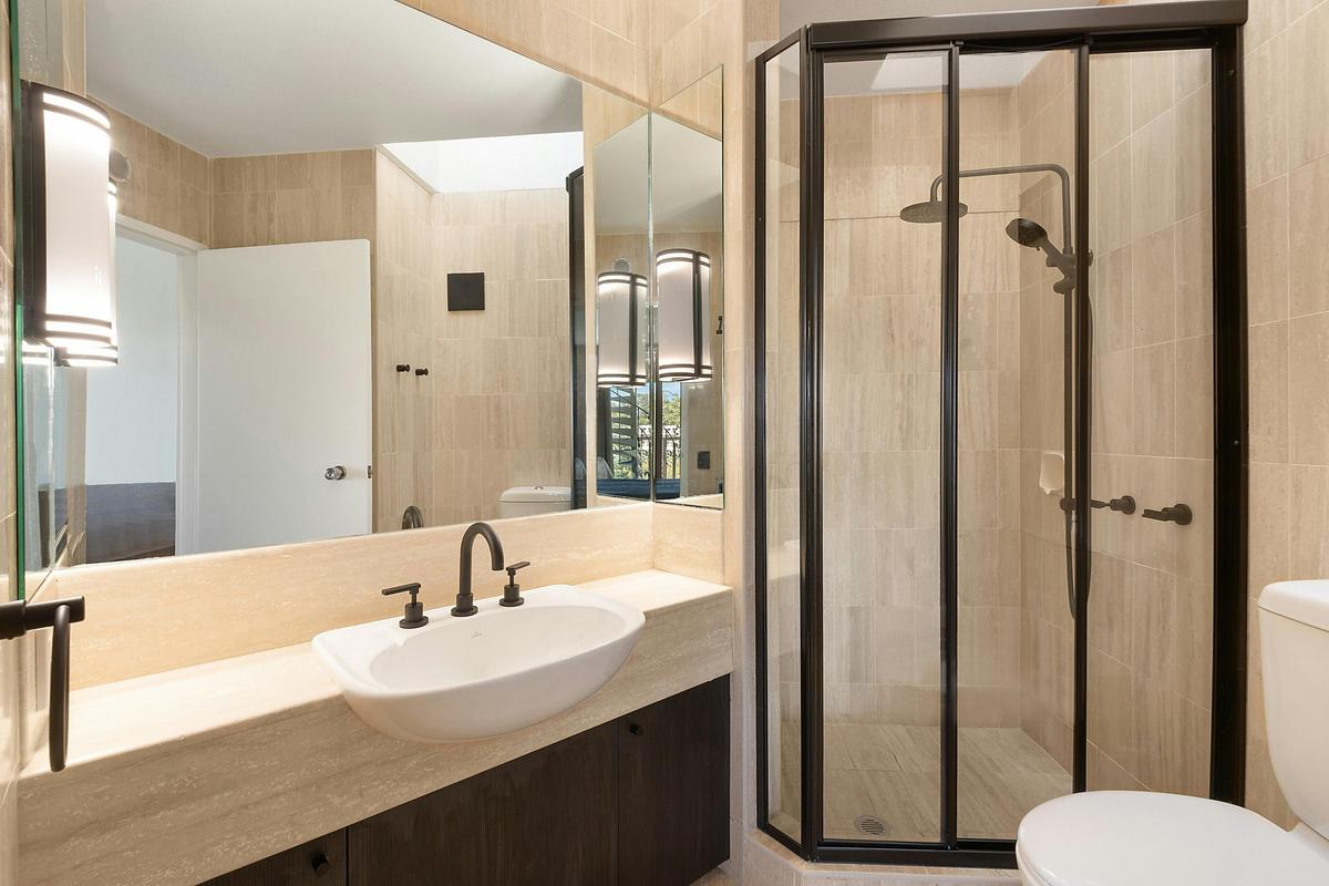Ensuite with stone finishes