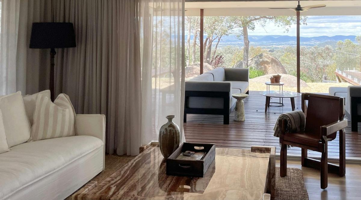 Sink into luxury lounges and drink in the country view