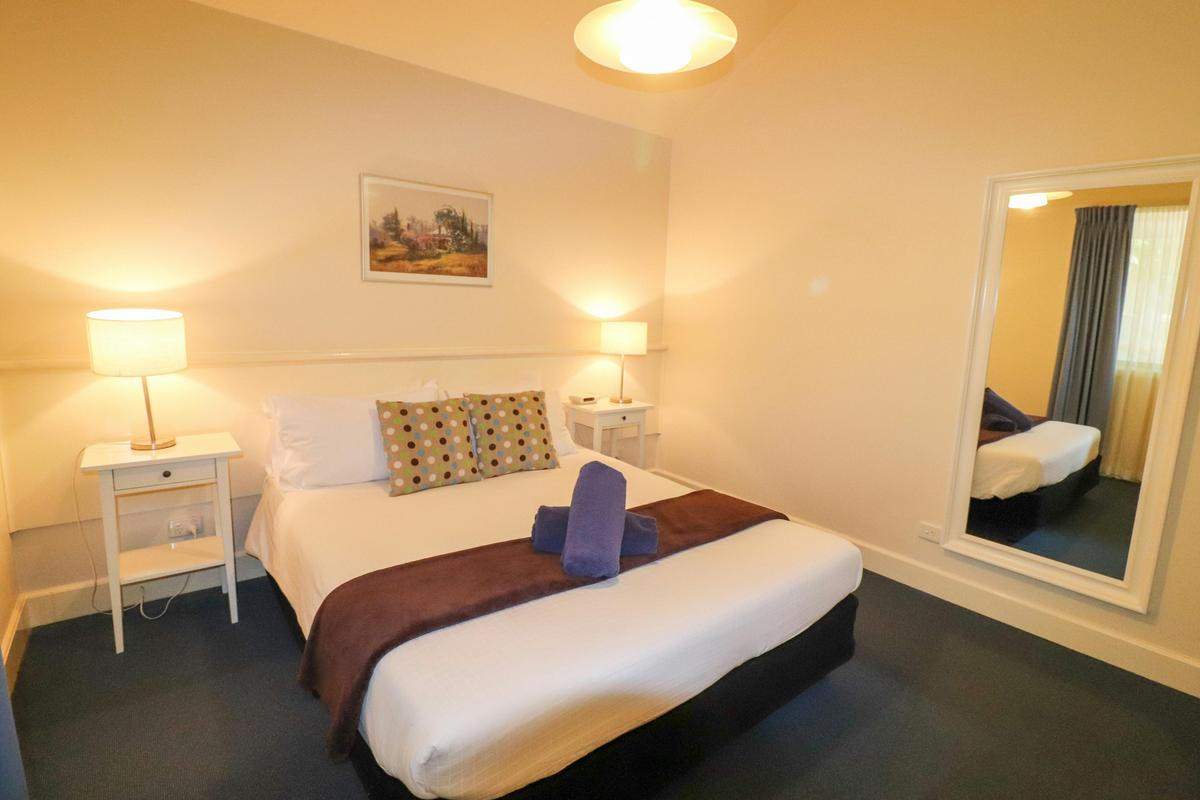 The Second bedroom features a queen size bed