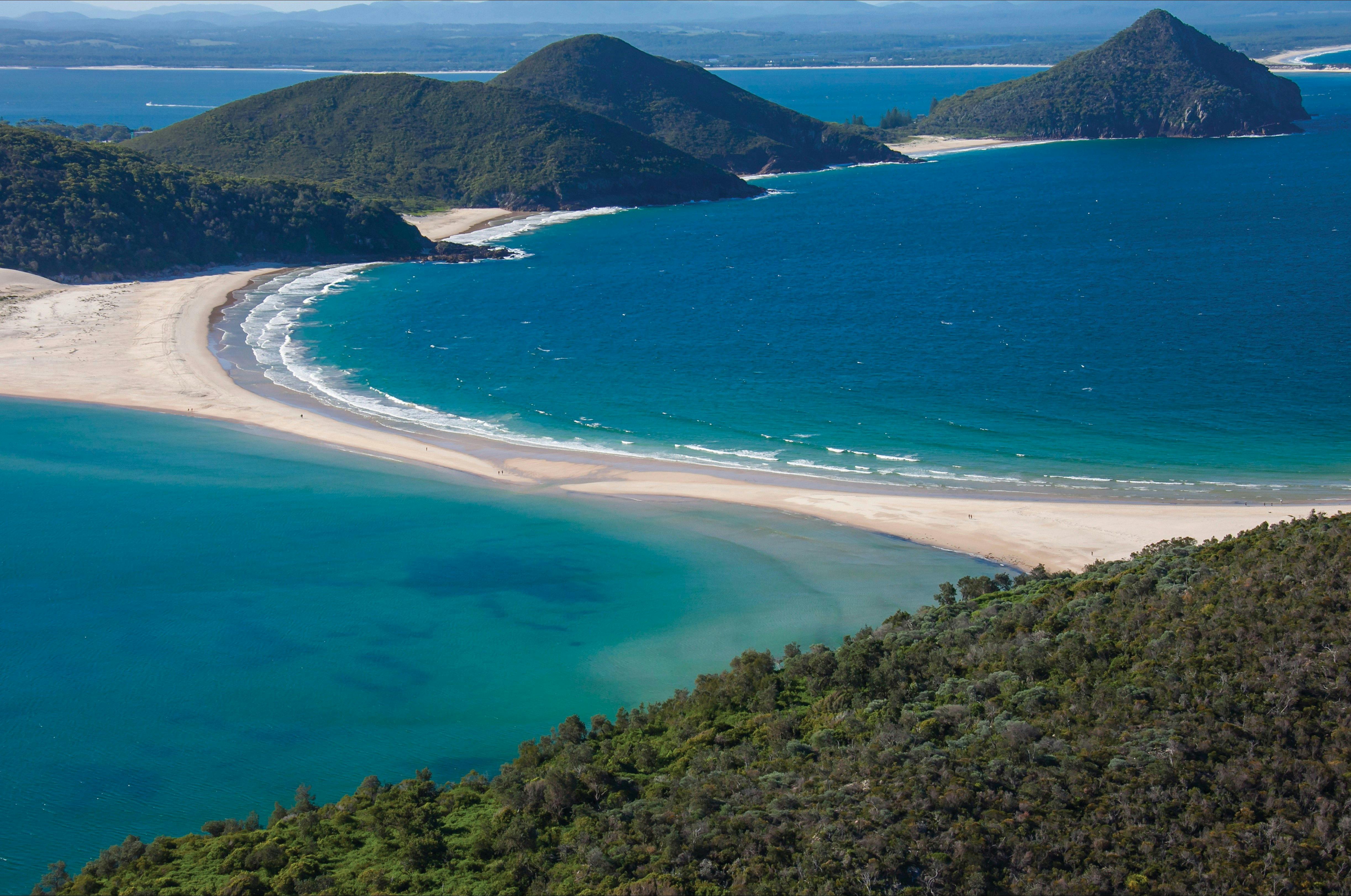 Coastal aerial of Fingal Spit with views towards Mount Tomaree, Port Stephens