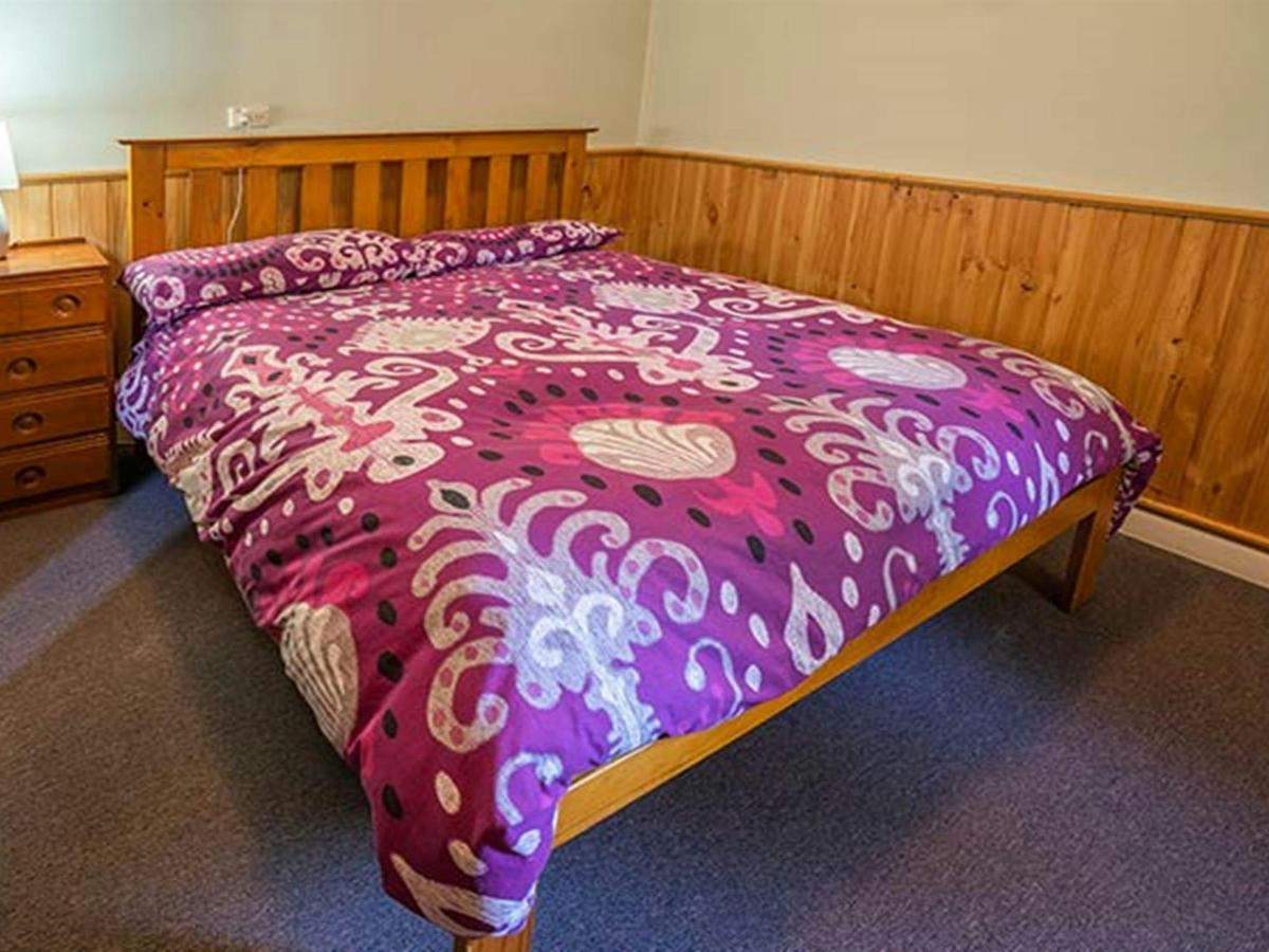 Main bedroom at Post Office Cottage in Wombeyan Karst Conservation Reserve. Photo: OEH/John Spencer