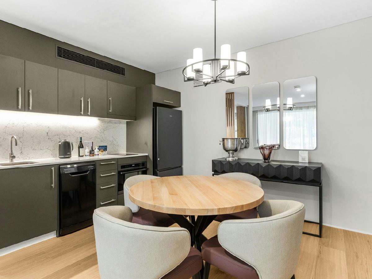 Grand Mercure Apartment Dining Area