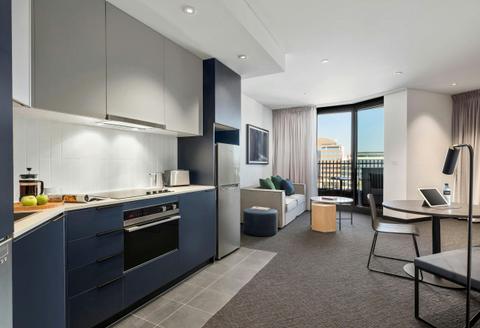 One Bedroom Apartment - Living Area and Fully Equipped Kitchen