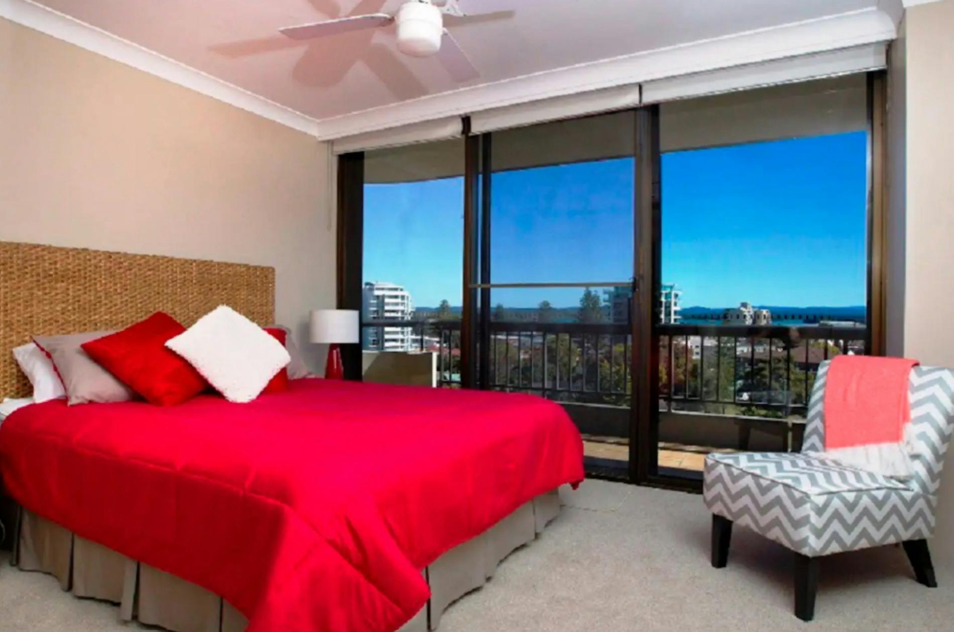 Master bedroom with Queen bed and skyline view
