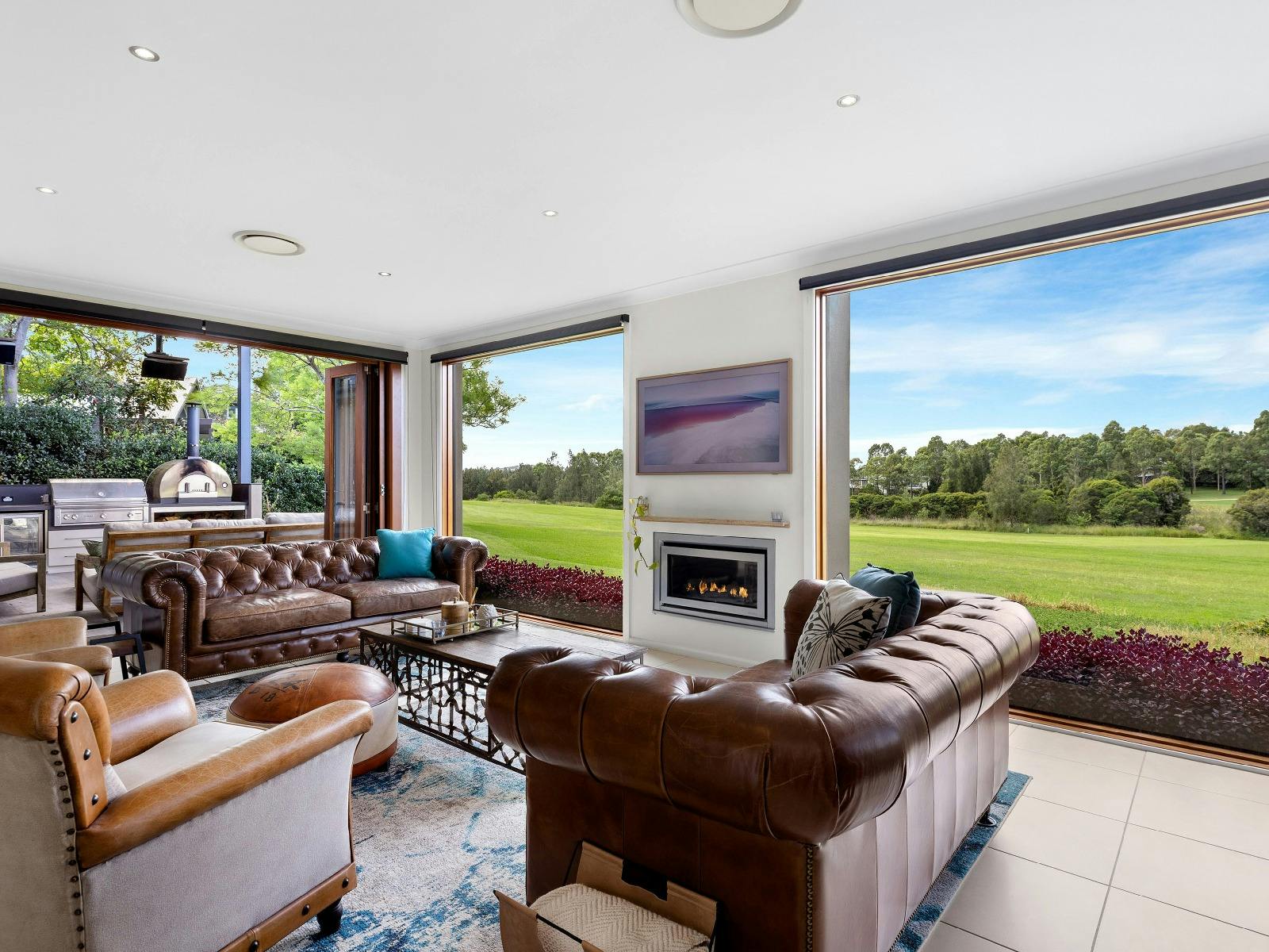 Peppertree Ponds lounge room and indoor fireplace