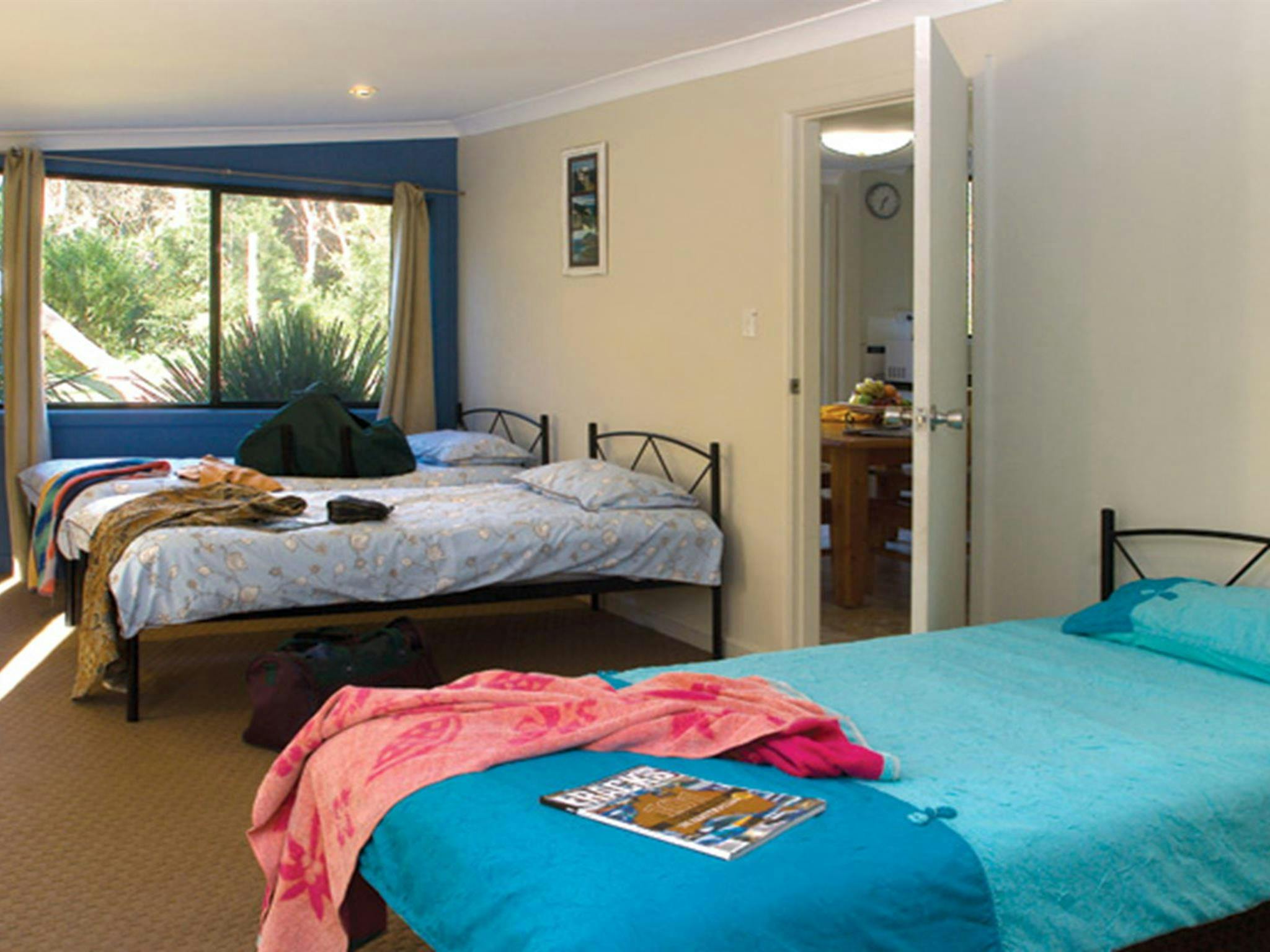 Bedroom area, Plomer Beach House, Limeburners Creek National Park. Photo: Michael van Ewijk/OEH