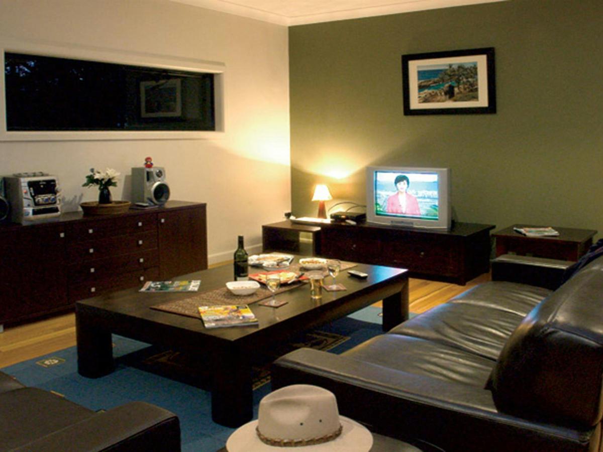 The common room area, Plomer Beach House, Limeburners Creek National Park. Photo: Michael van