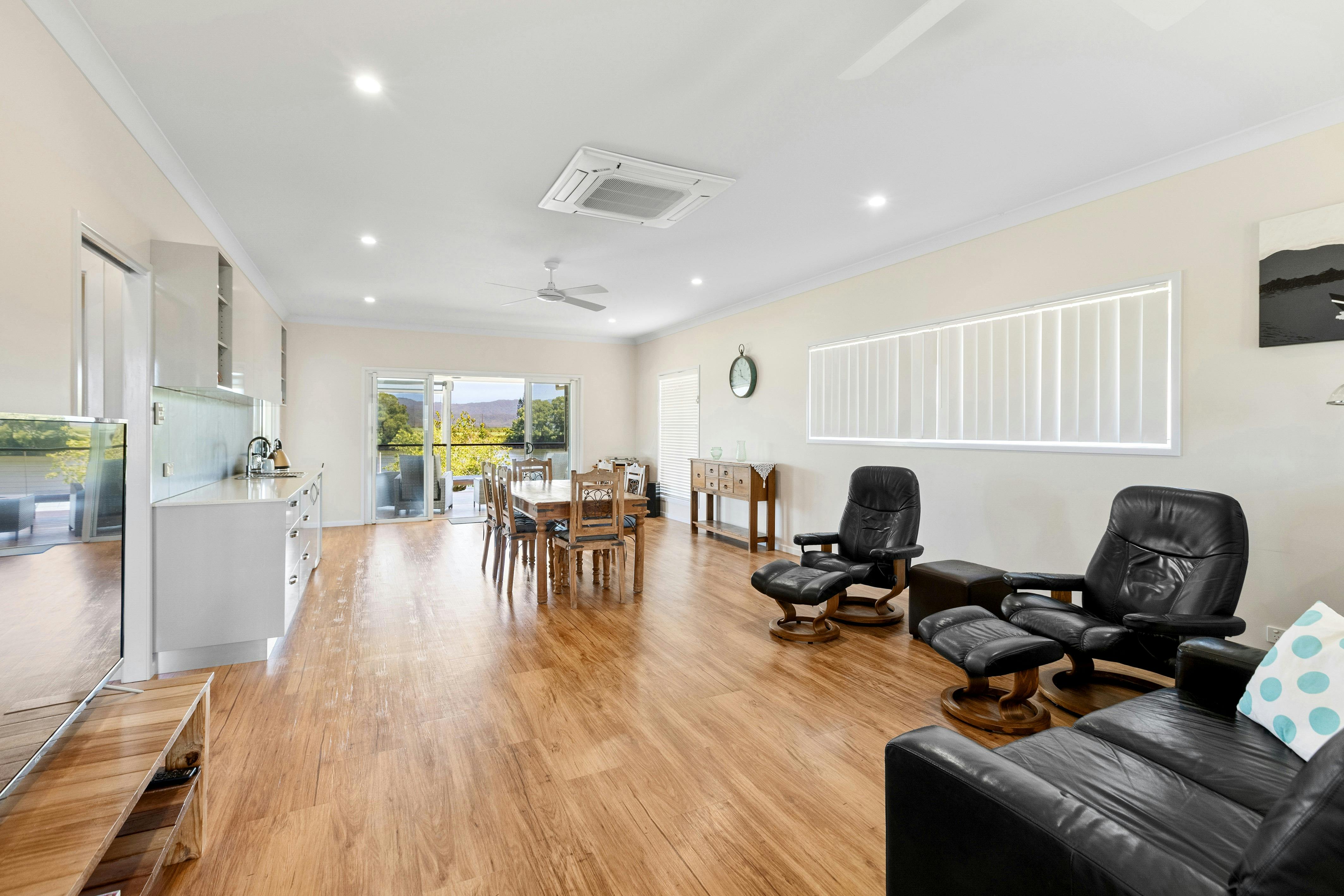 Open plan lounge, dining and wet bar