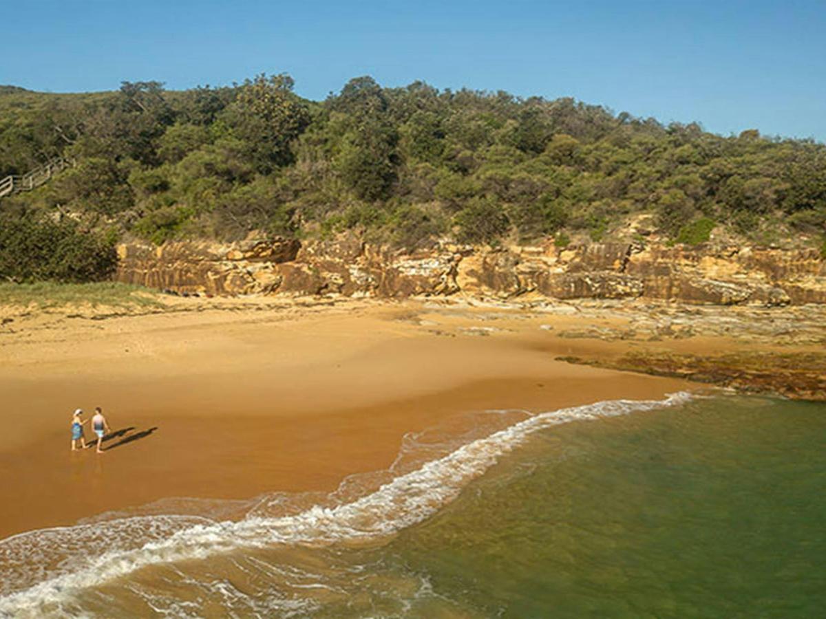 Aerial view of the headland at Putty Beach. Photo: John Spencer/DPIE