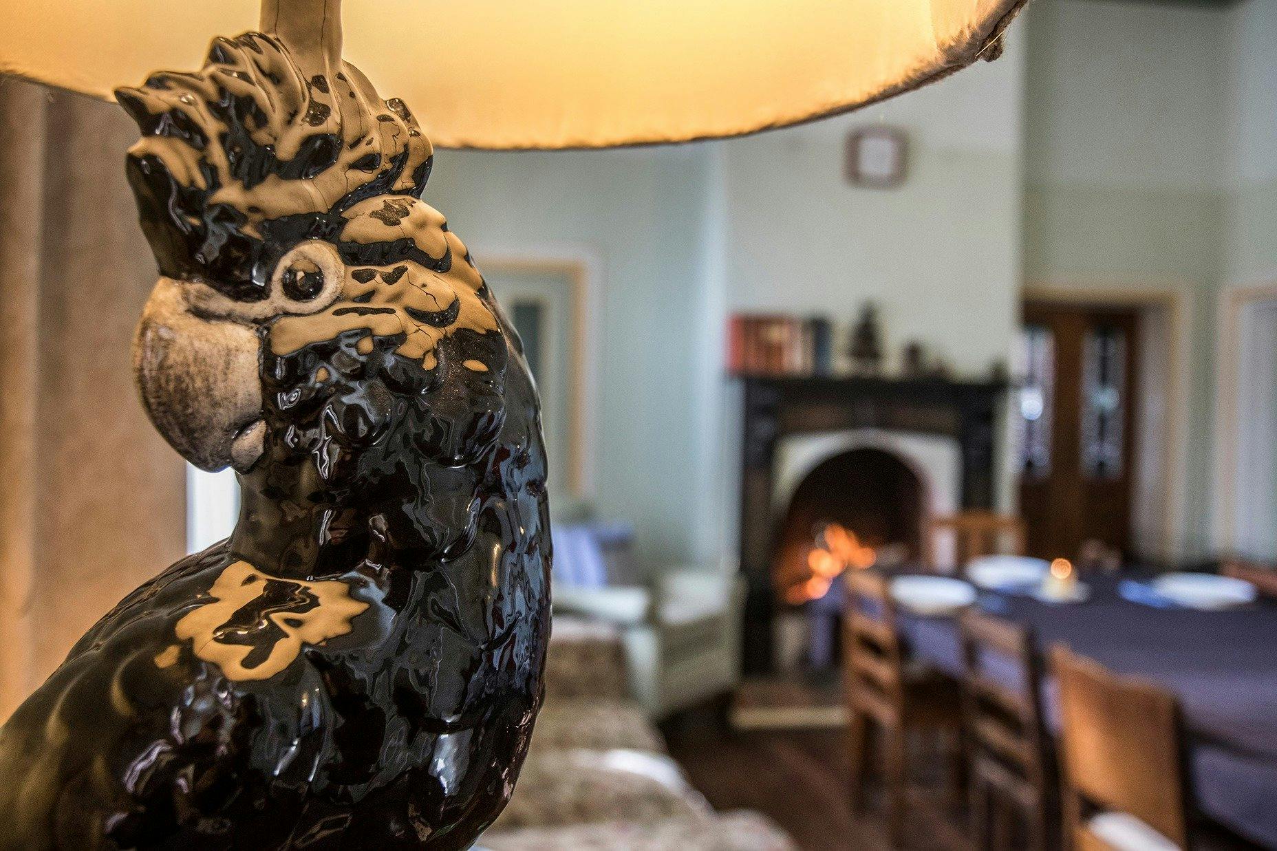 Our Black Cockatoo lamp greets you as you enter the Dining Room