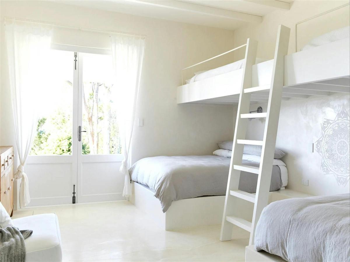 Cozy bunk bed room with built-in storage and space-saving design