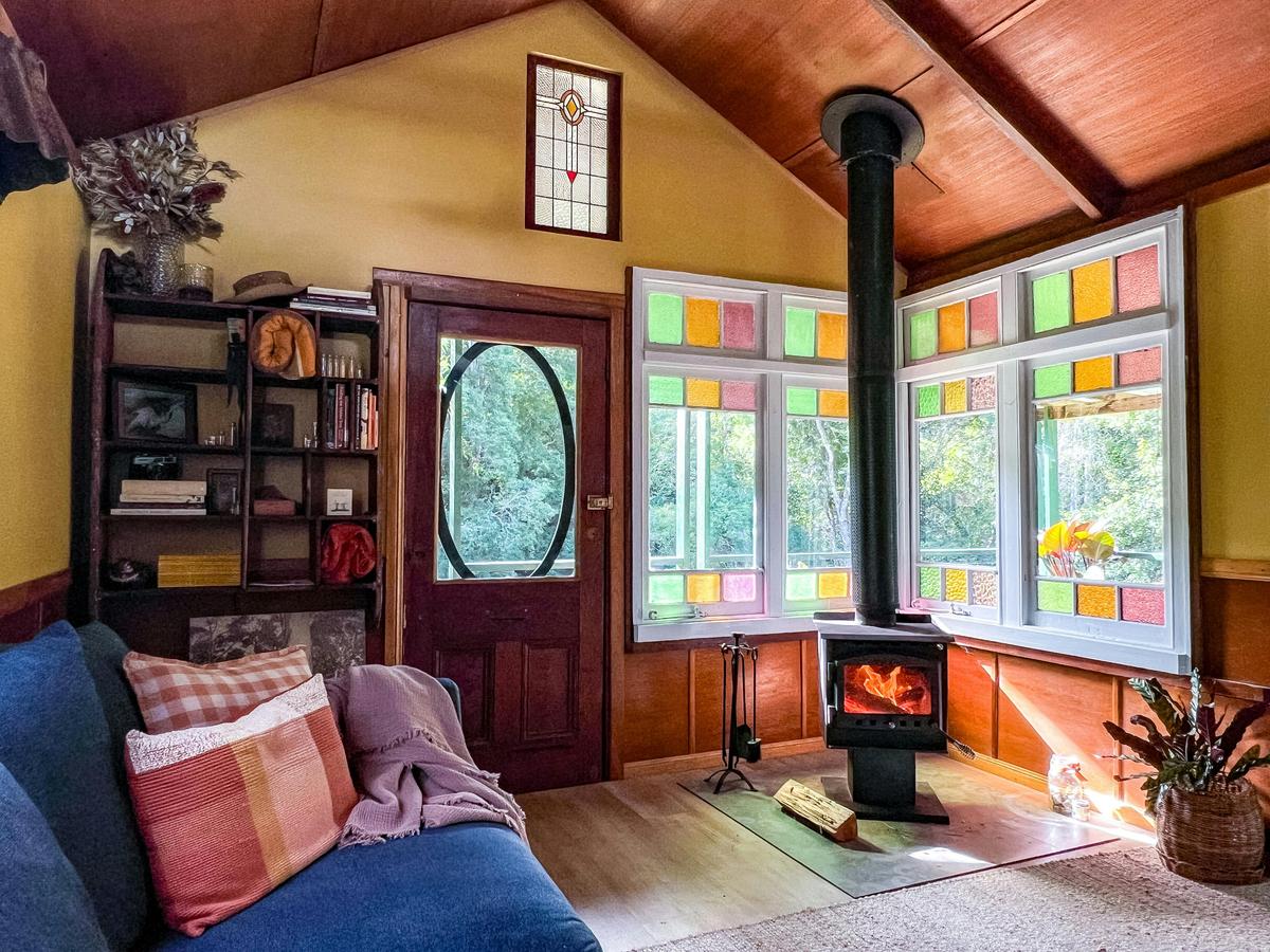 A warm and cozy day in front of the fire on the best couch in Bellingen