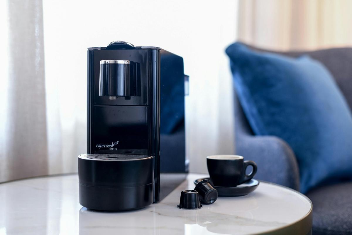 Complimentary espresso coffee pod machine