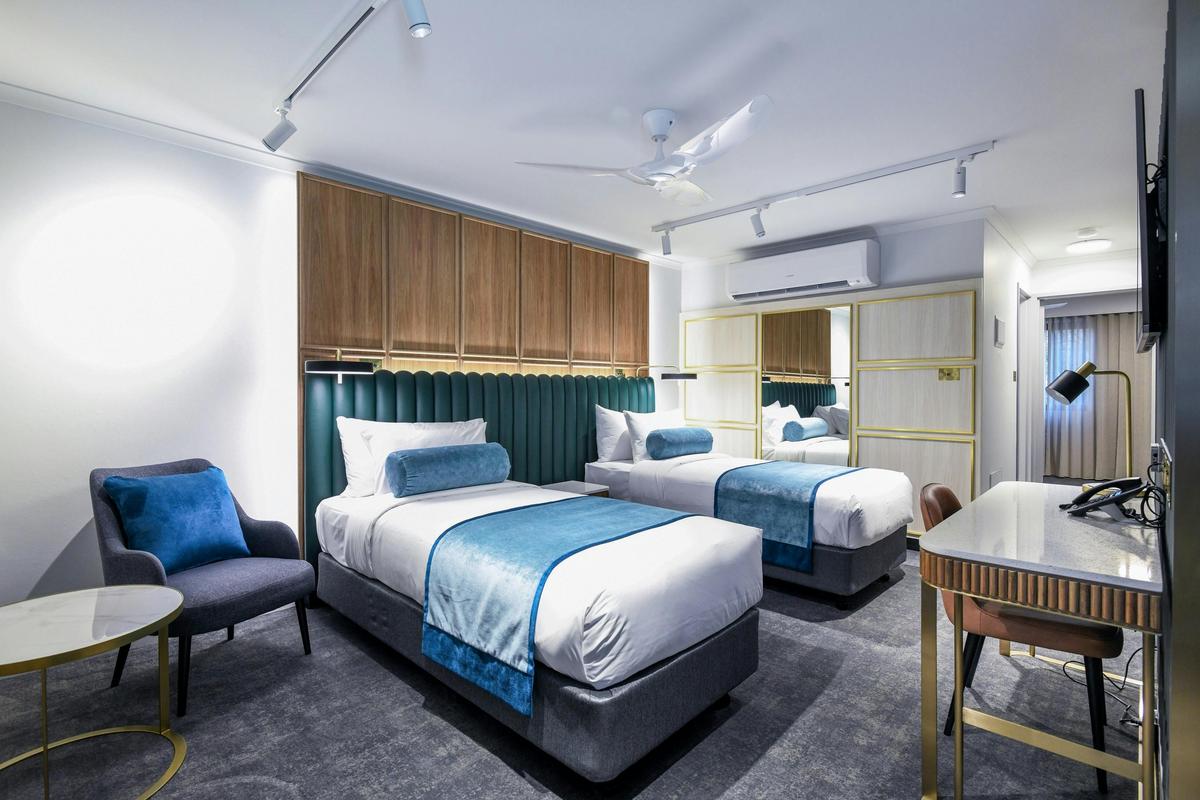 Main room with 2 King Single Beds