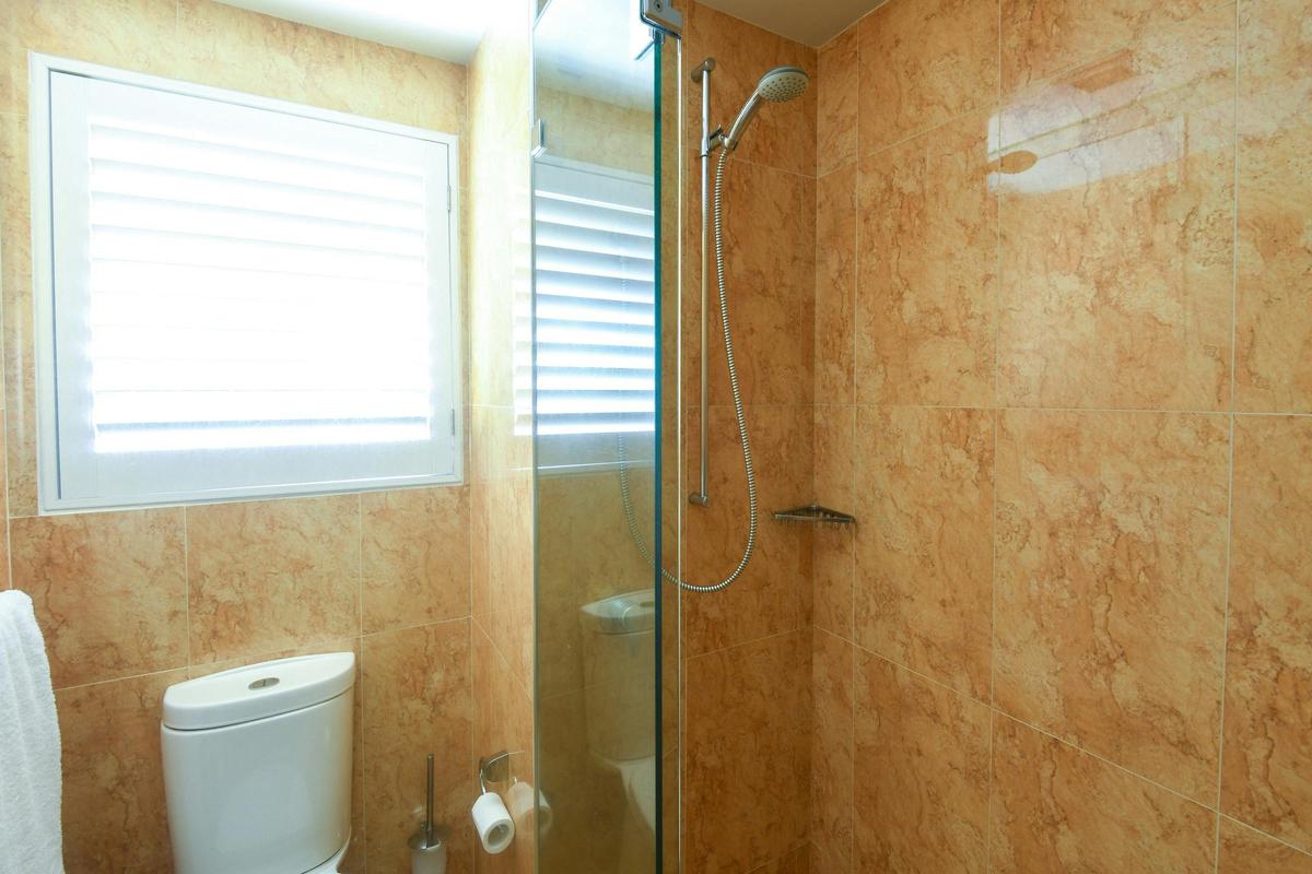 Shower in marble bathroom