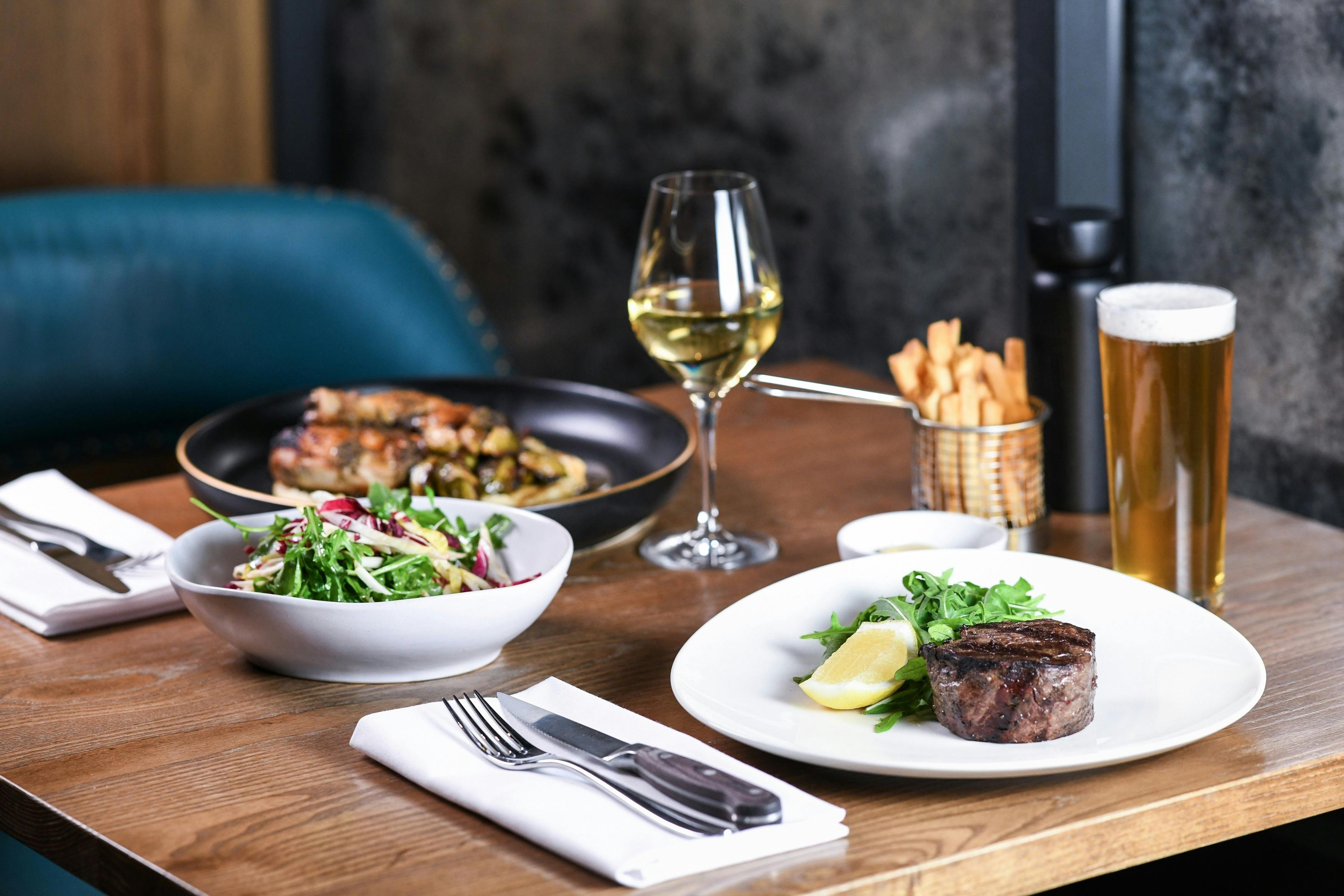 Enjoy mouth water wood fired dishes including World's Best Steak, local Jack's Creek Beef.