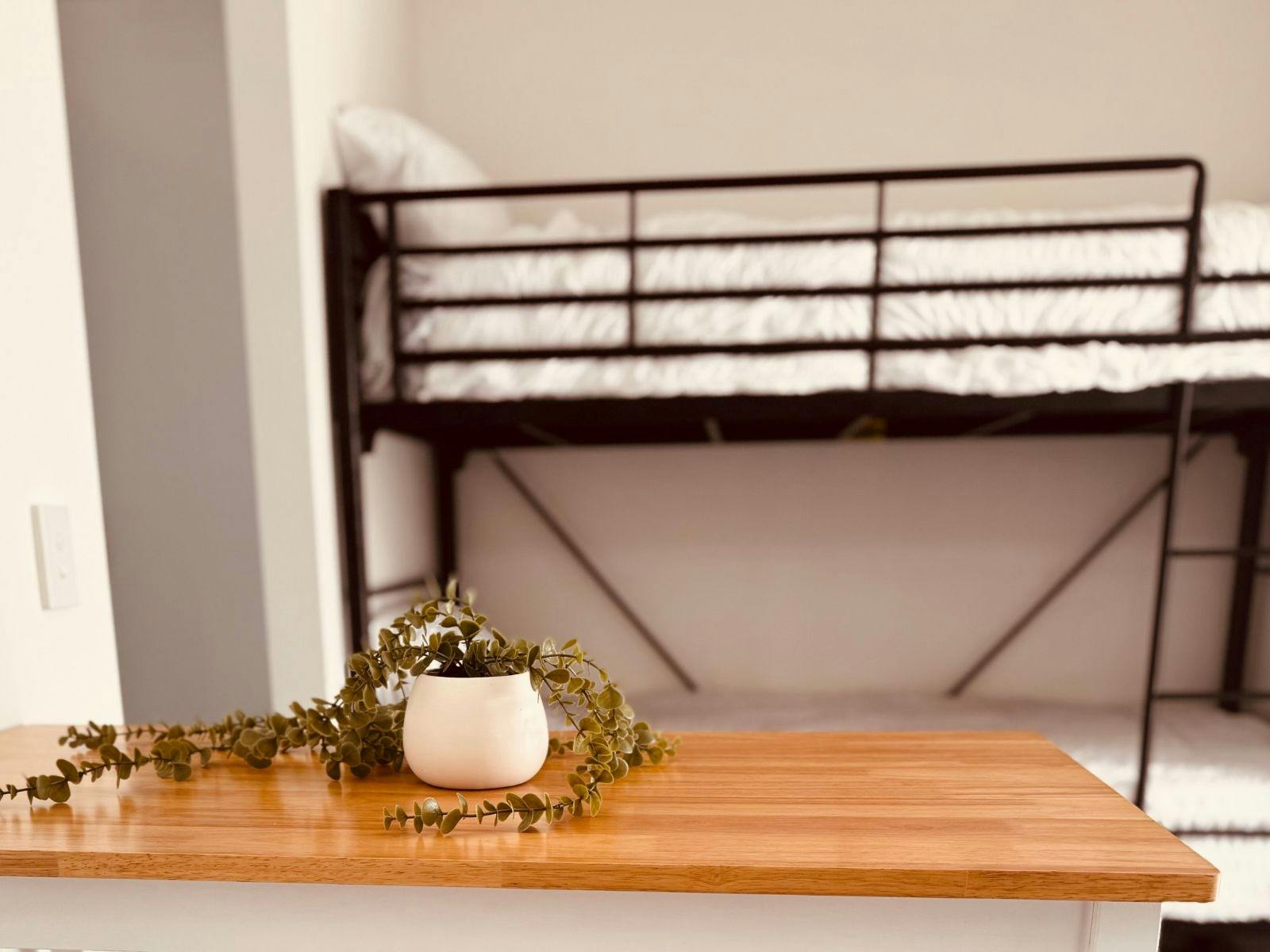 Bunk beds located in the open lounge area (raised dining table)