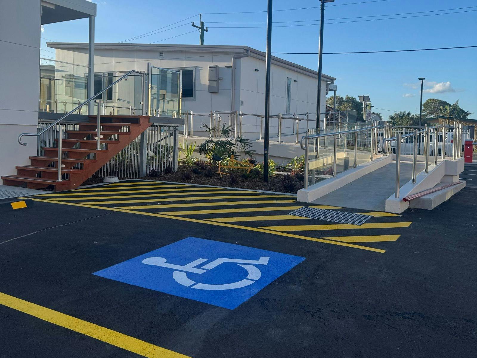 Accessible Parking with ramp access to rooms