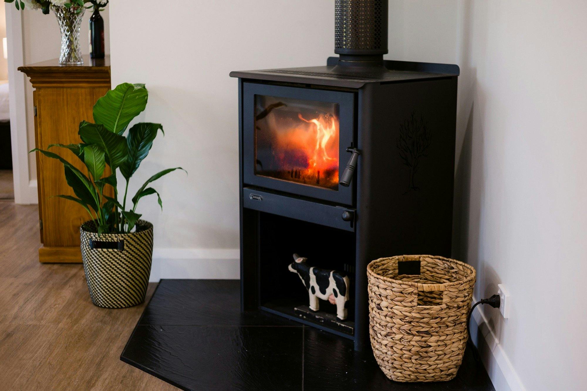Enjoy the cosy fire at Roseanna Cottage
