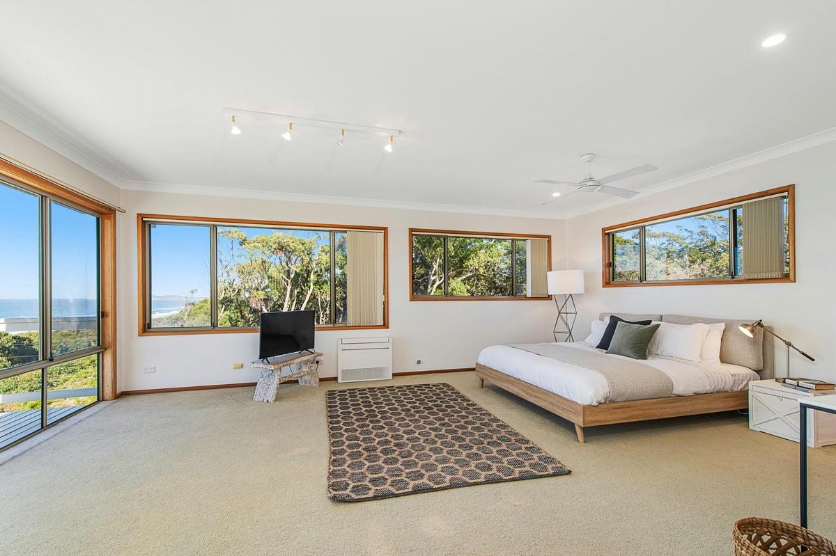 Master bedroom with ocean views and ensuite