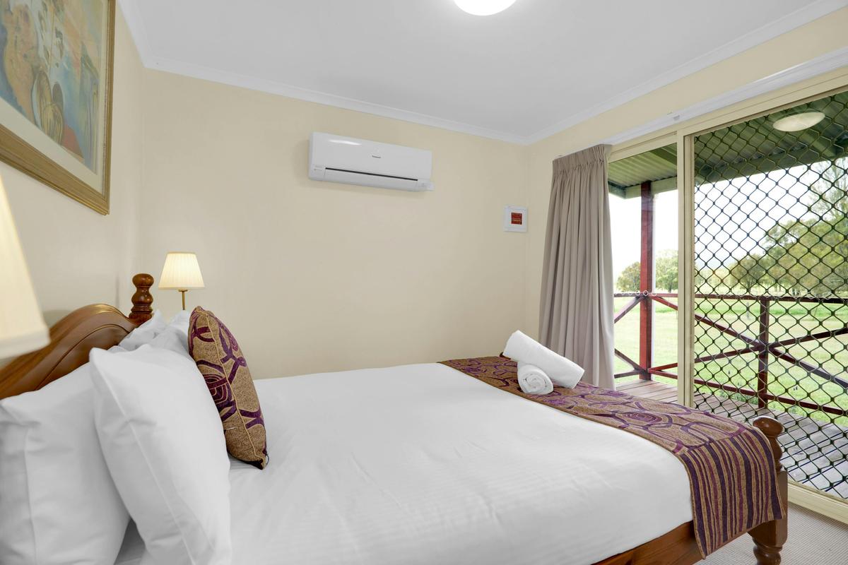 Master bedroom with queen bed