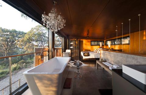 Upstairs open plan bedroom & bathroom