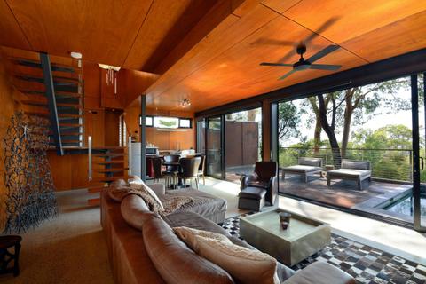 Downstairs lounge leading to private heated plunge pool