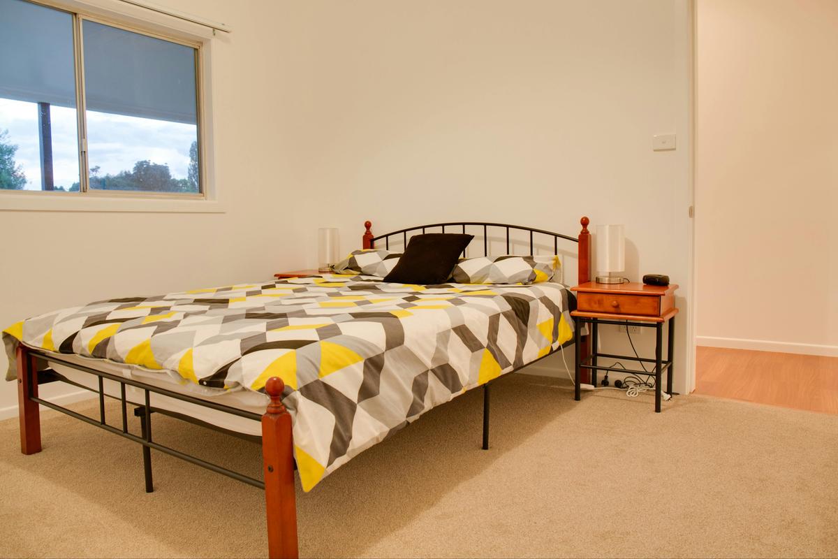 Main bedroom with ensuite and television