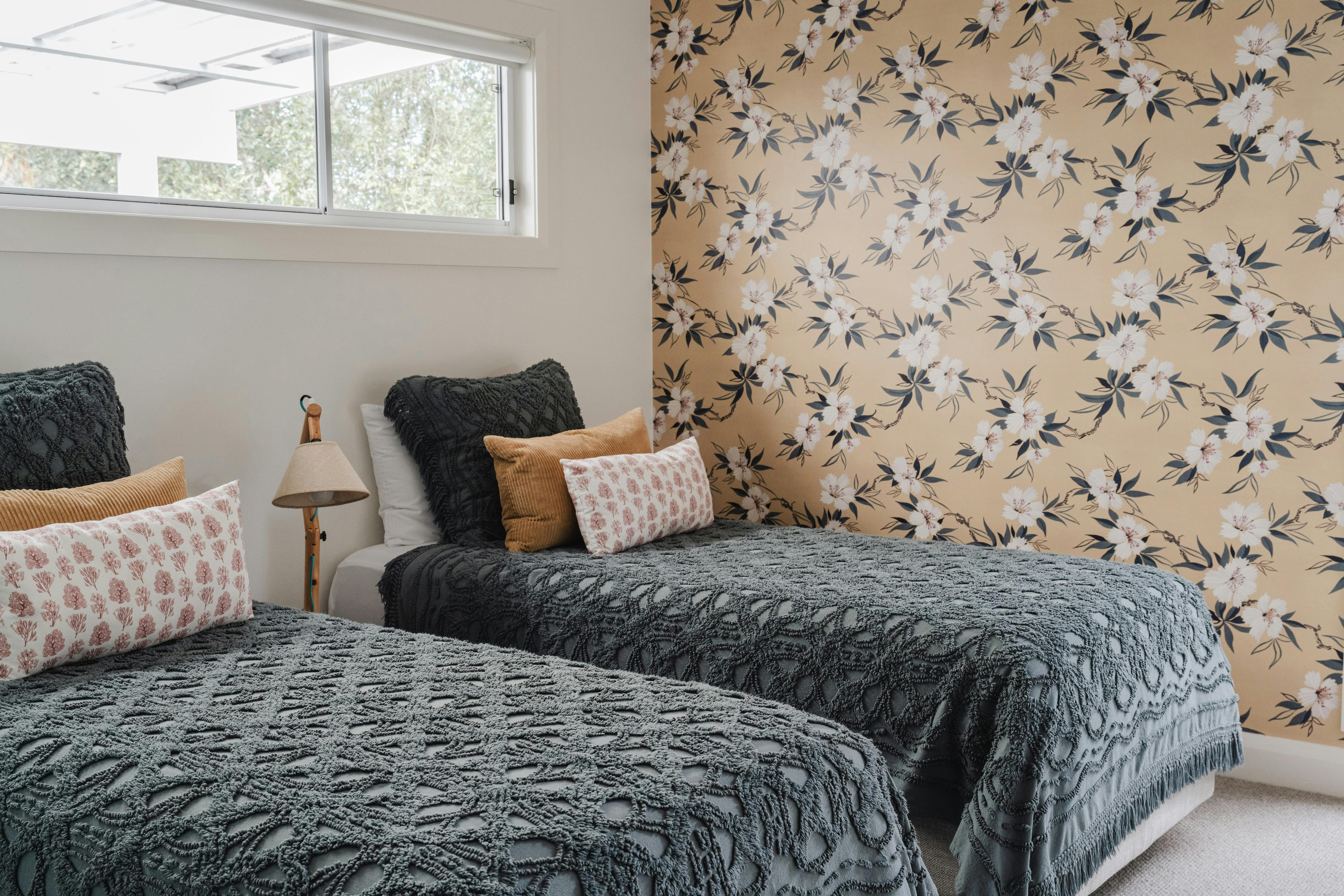 Third bedroom with hotel quality Microcloud bedding and two long singles