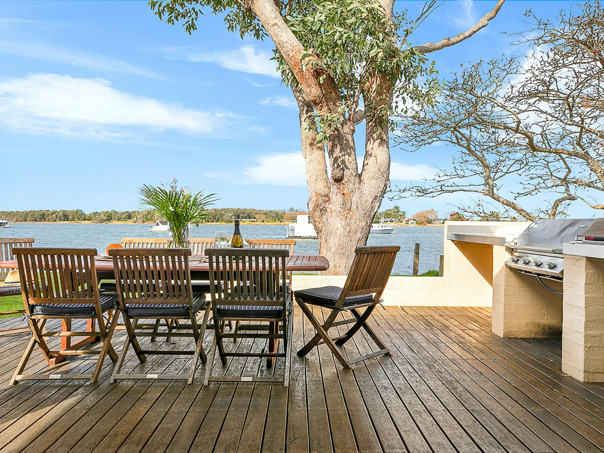 Outdoor deck and BBQ overlooking river
