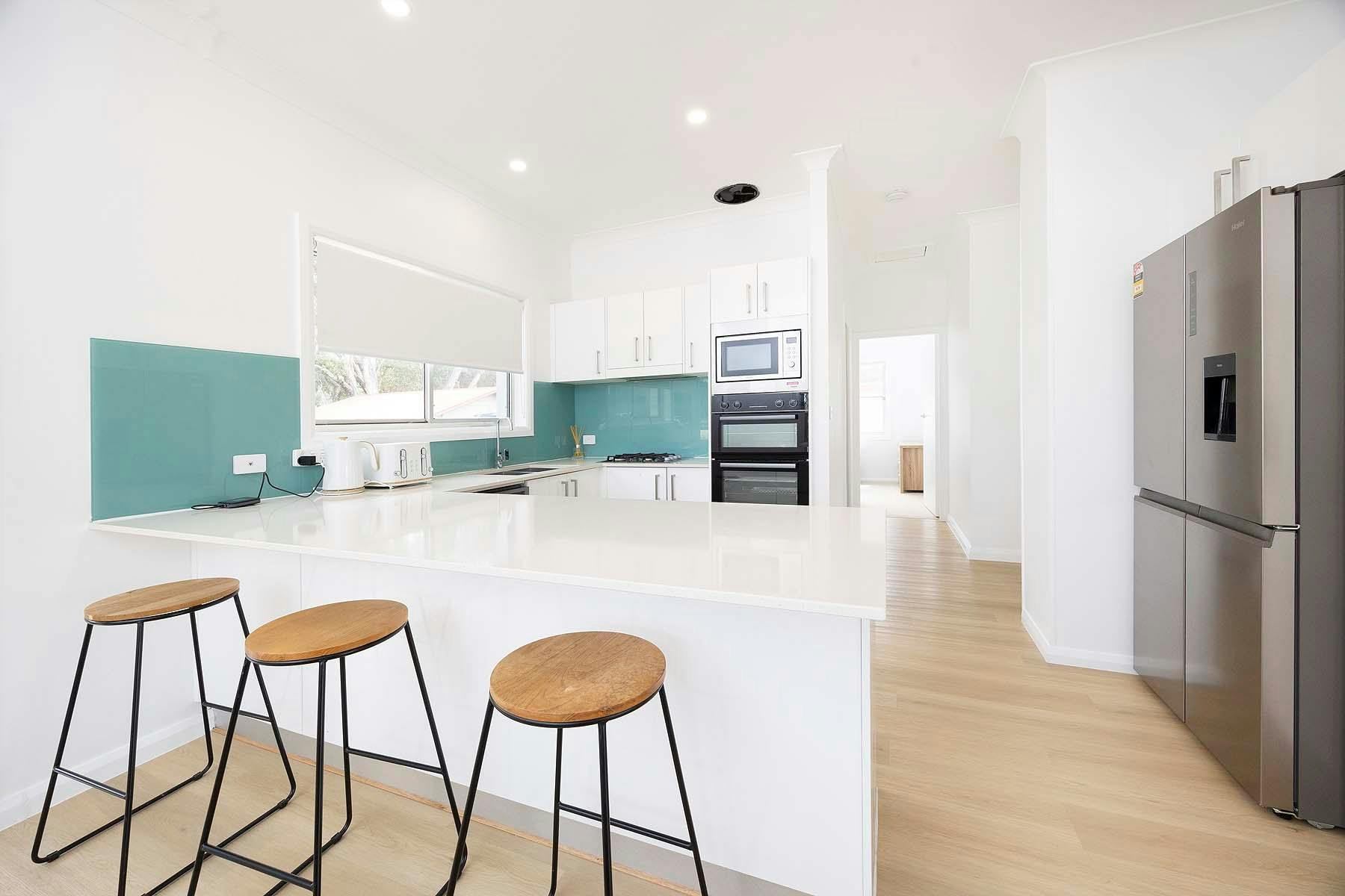 Kitchen and breakfast bar