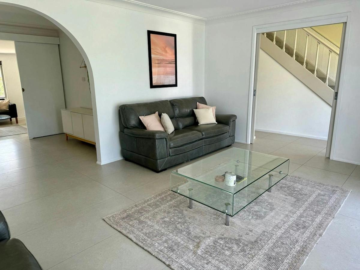 large open plan living areas with a two seater lounge