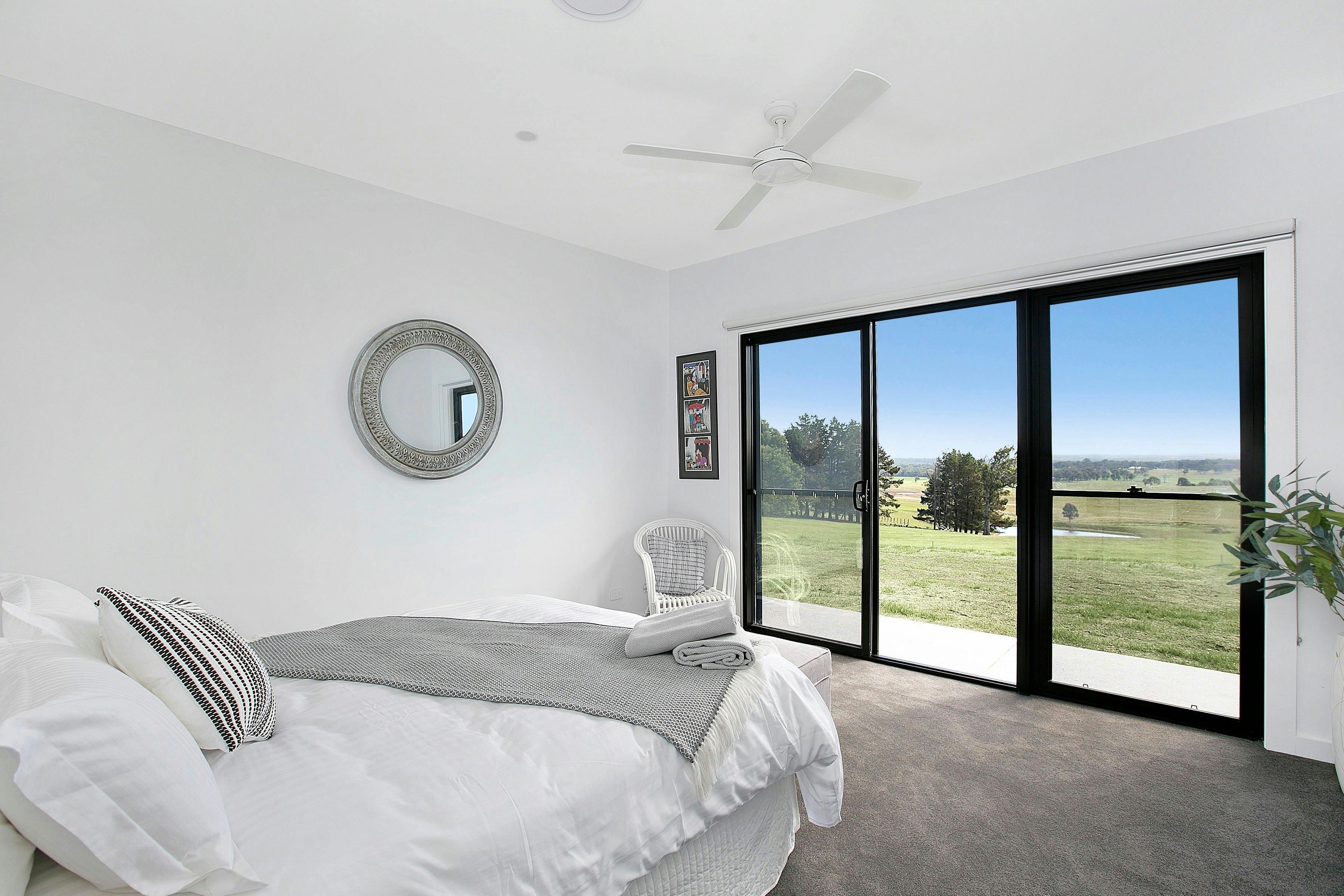 Queen size bedroom with picturesque views