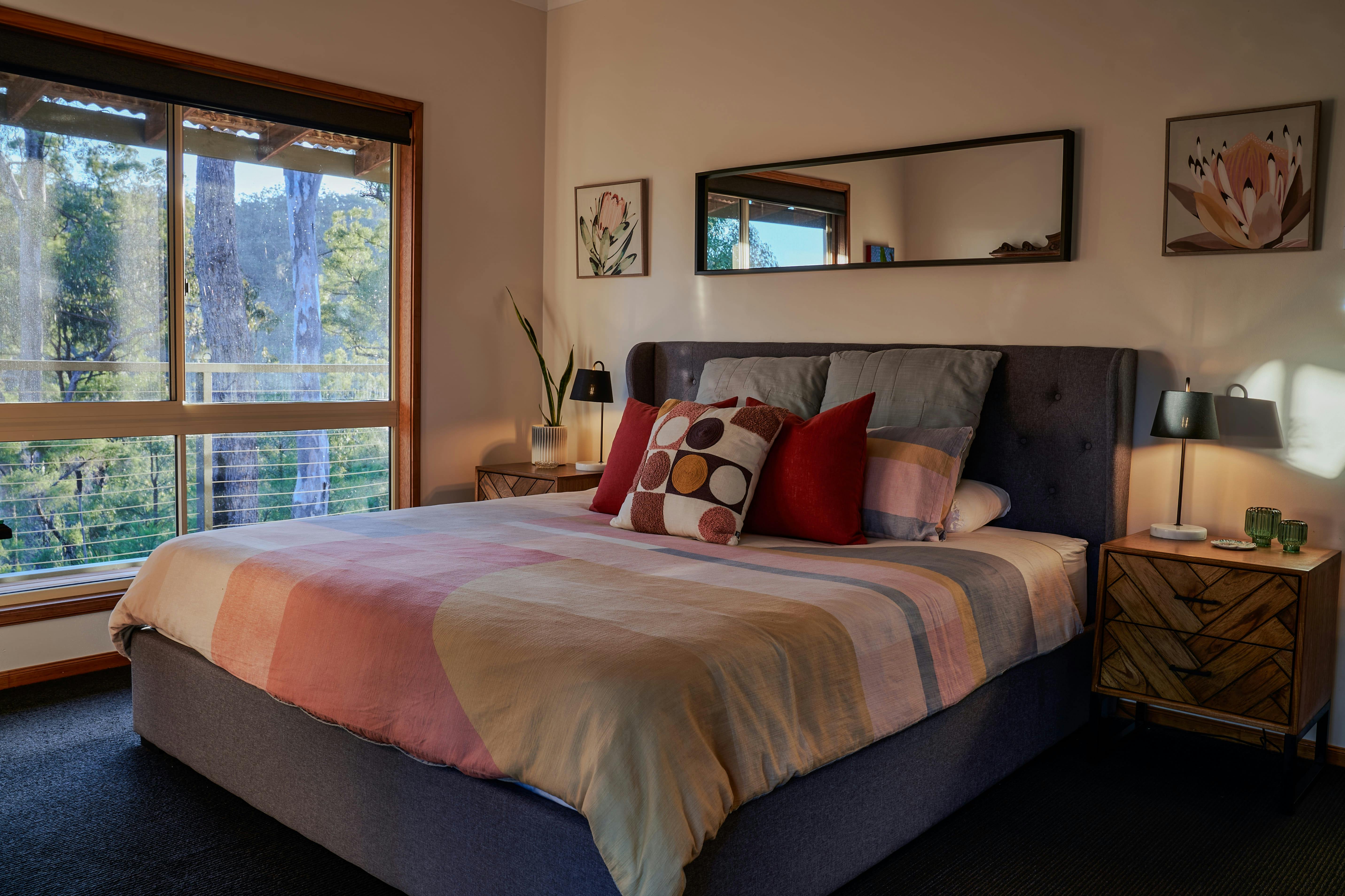 Generous king bedroom with private ensuite and direct access to verandah