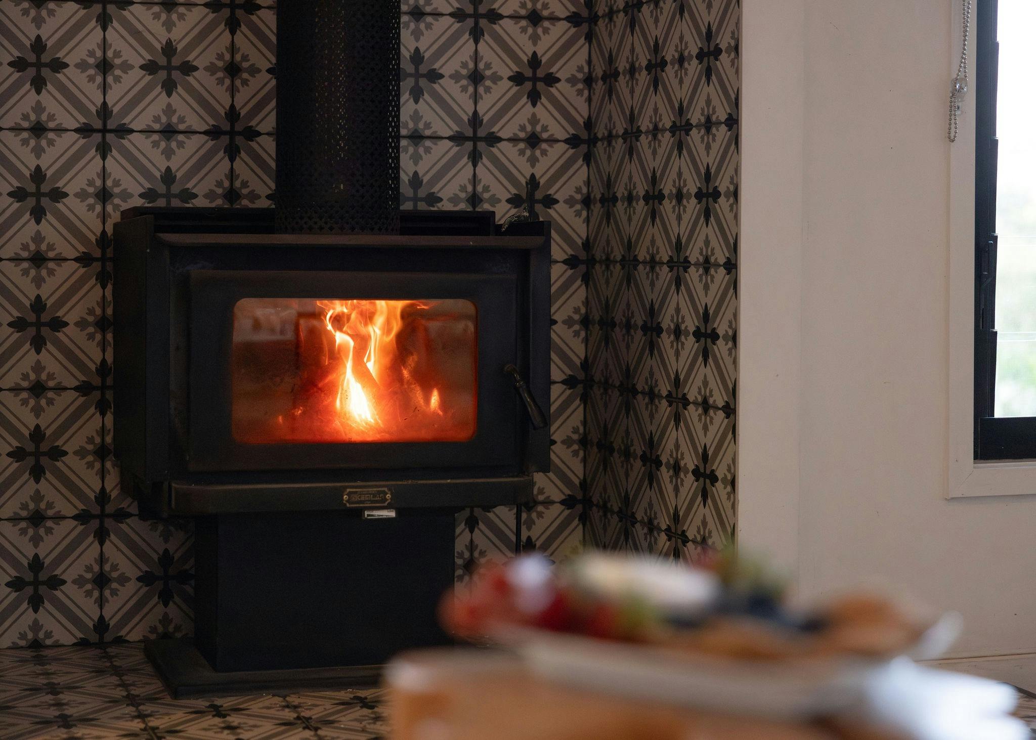 Cozy up in front of the wood fire at Tallaringa Views with complimentary firewood