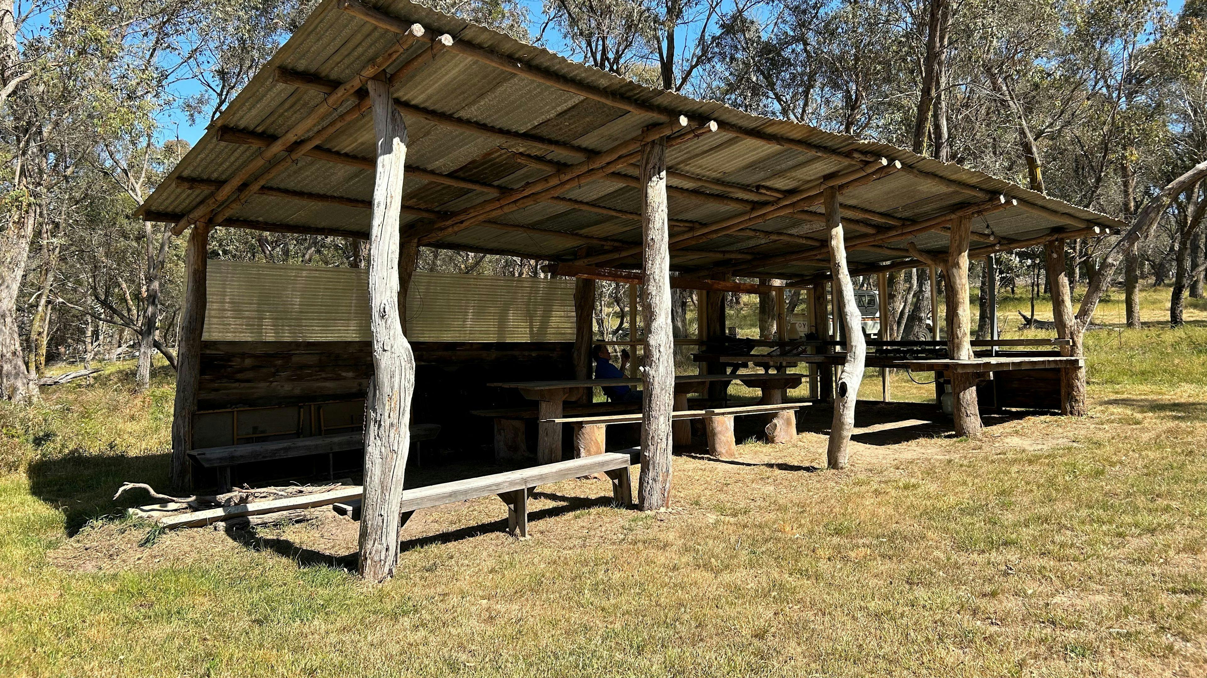 BUSH KITCHEN: picnic table & benches seats 16, food prep bench, x2 gas cookers (BYO LPG gas), double sink (no taps, BYO water), undercover firepit. 