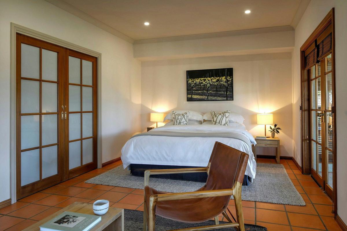 Downstairs bedroom with sitting area