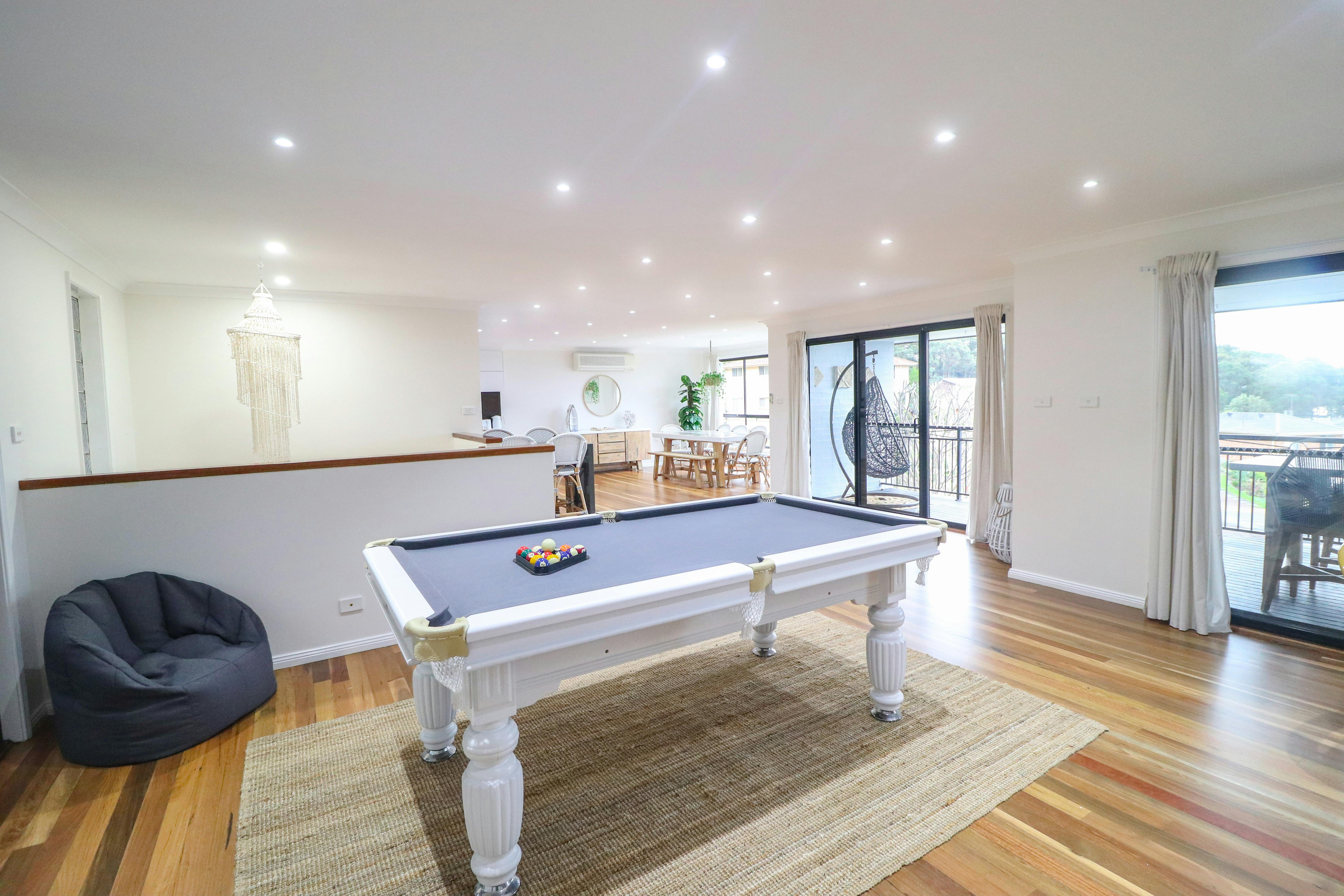 have a game of pool,  dining are at the corner