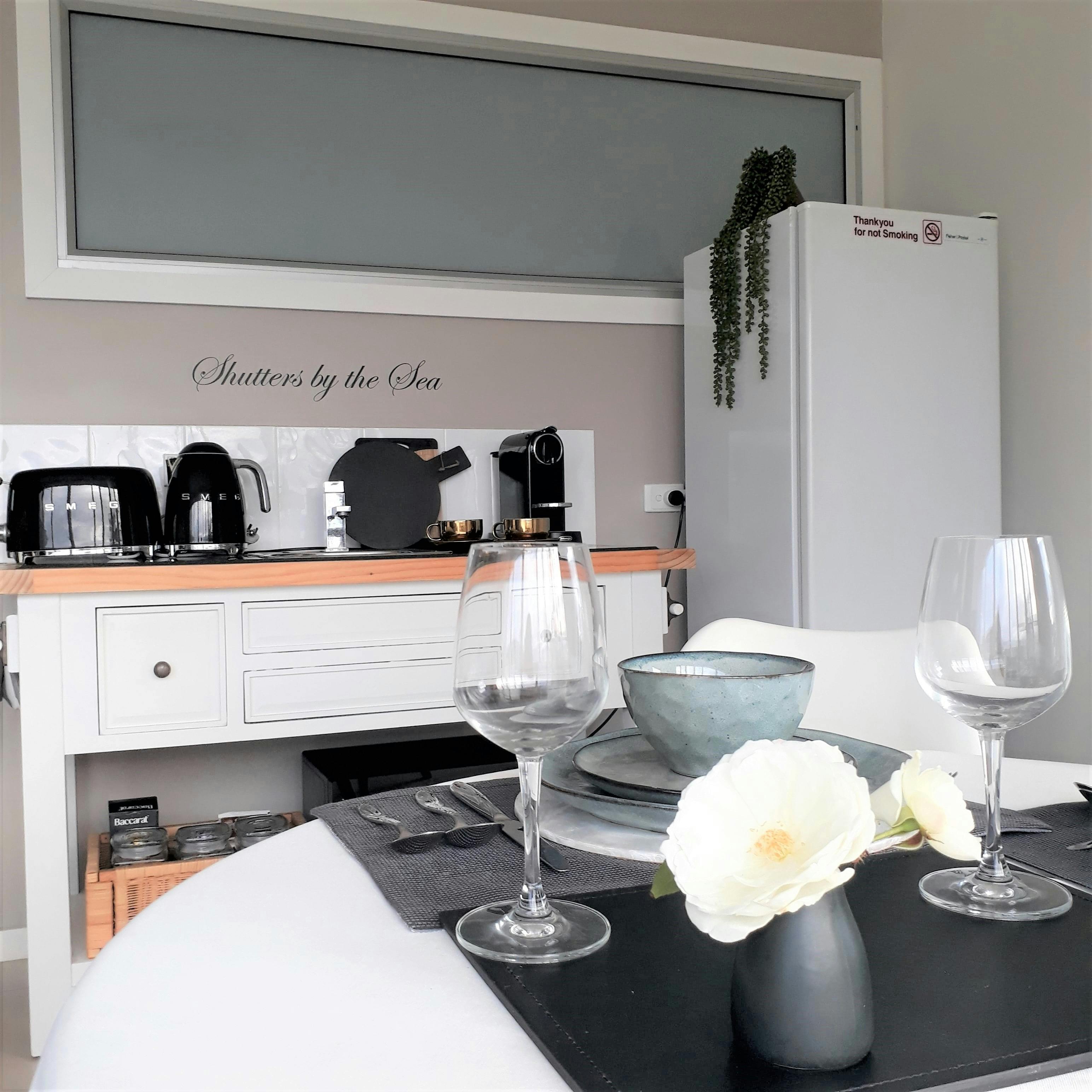 Kitchenette and dining area for a relaxed getaway at Shutters by the Sea Kiama
