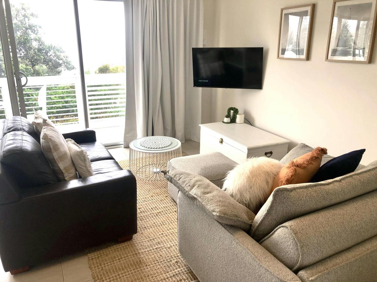 Comfortable seating and Smart TV with a sea view