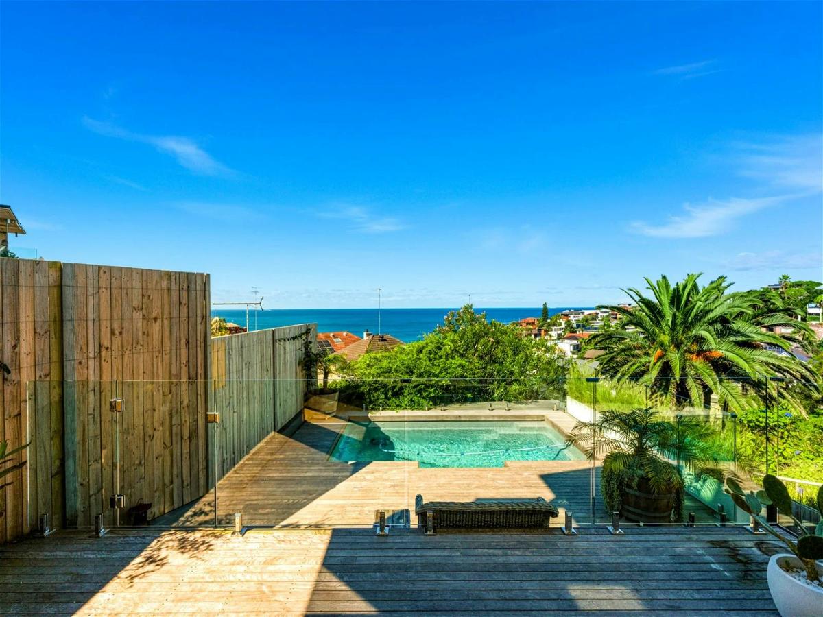 a big terrace with pool as well as a spacious balcony