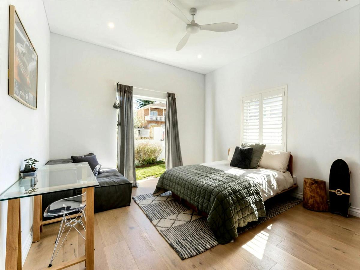 The bedroom area also offers a full-sized bathroom with a lovely bathtub