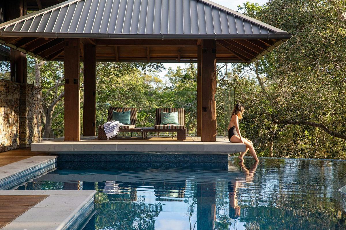 The infinity pool and its cabana