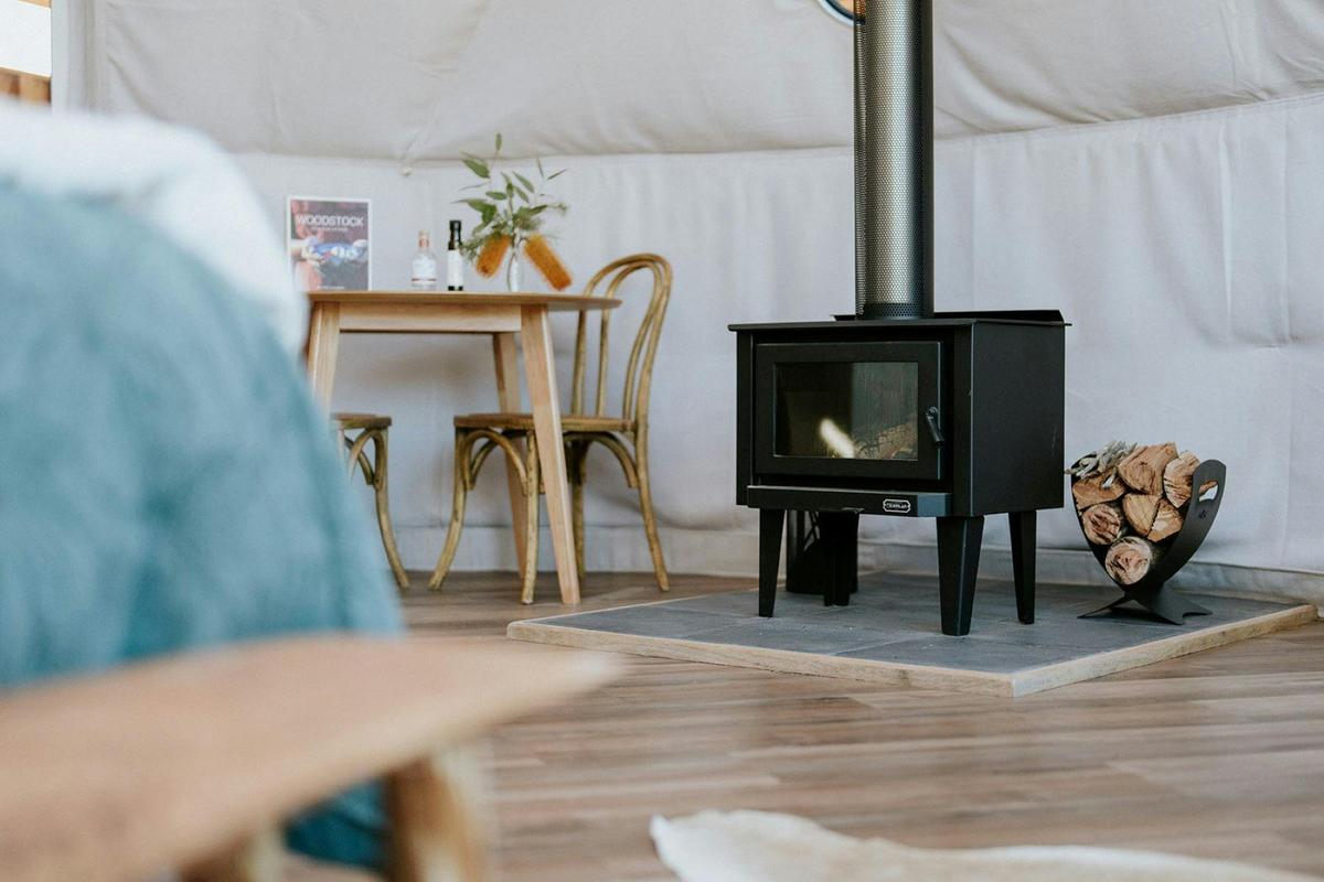 Log fire and dining area in your dome