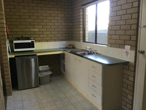 Kitchenette - microwave, hotplate, toaster, kettle, cutlery and crockery all included.