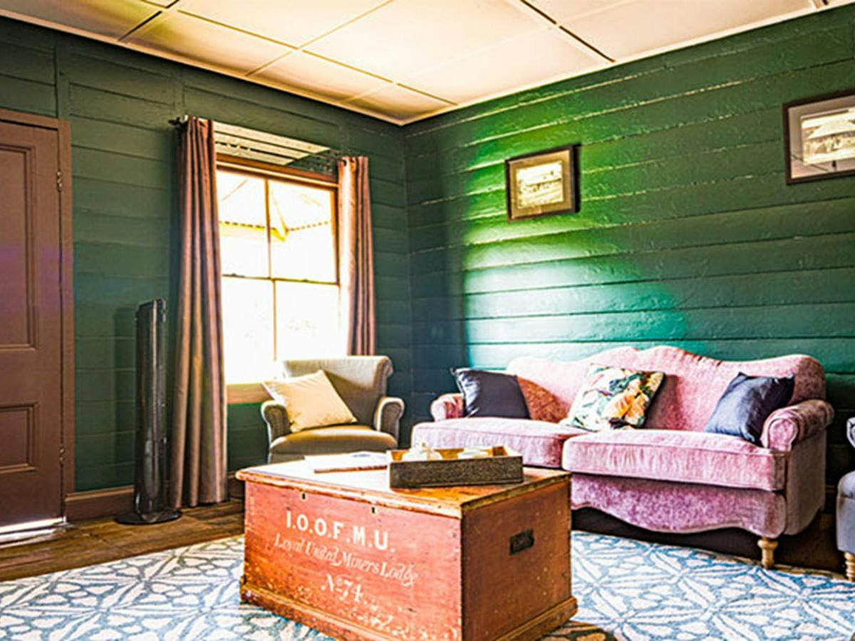 The lounge room at Sydney Hotel Cottage in Hill End Historic Site. Photo: Steve Garland &copy; DPIE