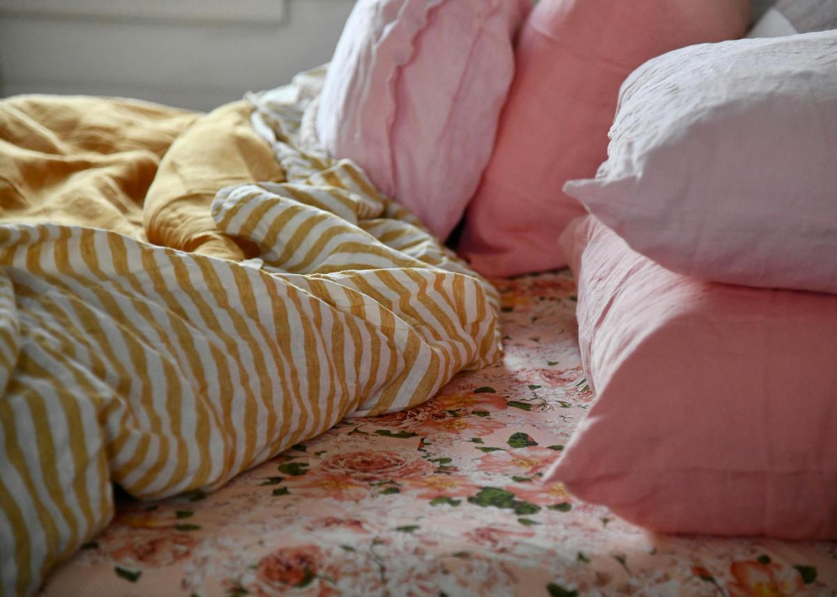 Luxurious, cheerful linen on the custom made king size bed.