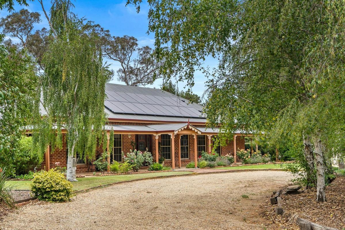 Front of house with driveway at "The Estait" Homestead