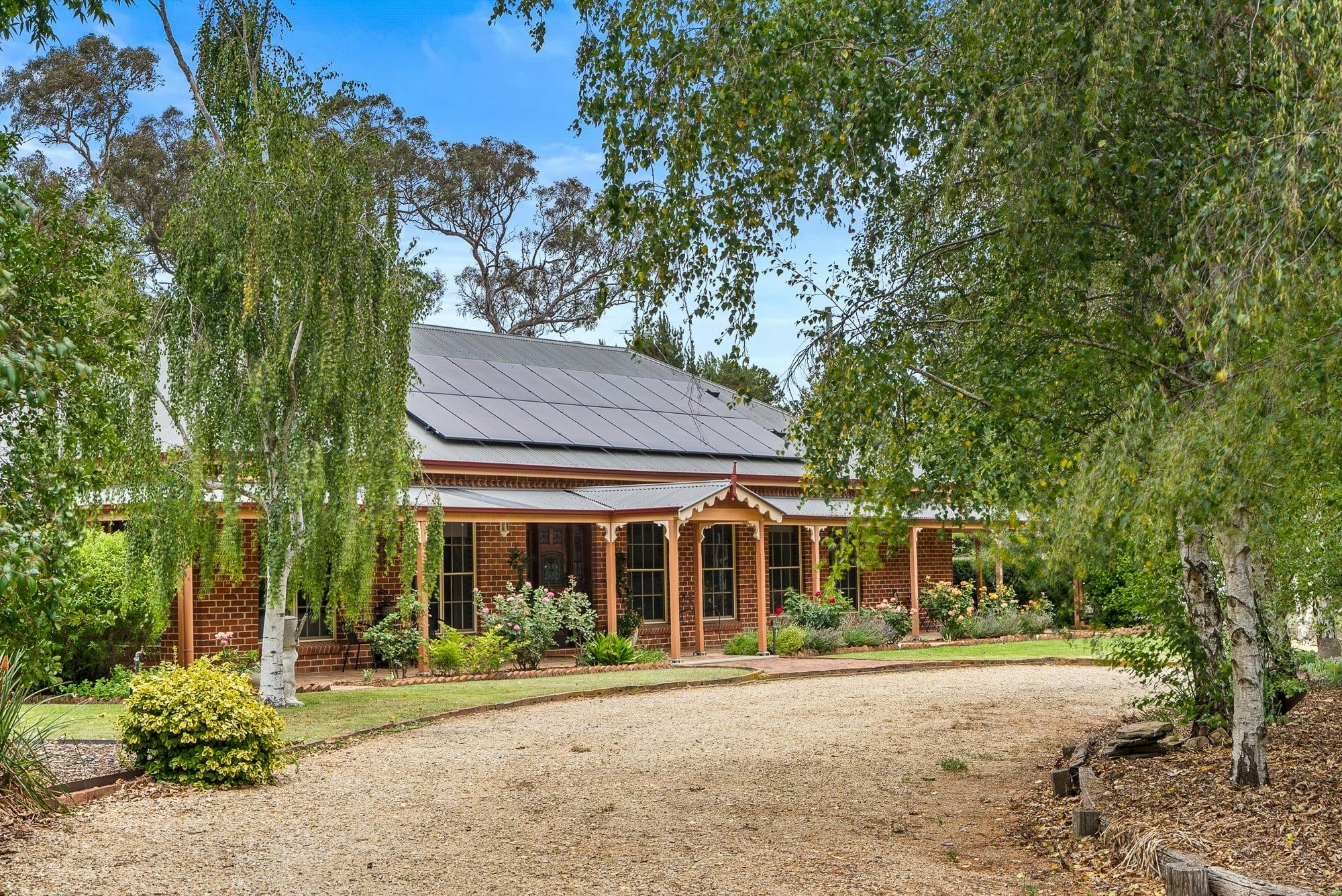 Front of house with driveway at "The Estait" Homestead