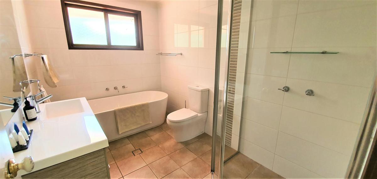 Bathroom with generous sized bath